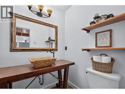 Main level powder room for guests - 