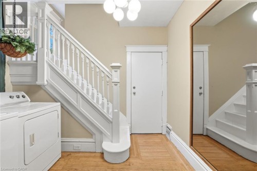 front foyer shared laundry - 63 Melrose Avenue S, Hamilton, ON 