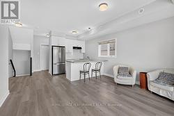 View of the kitchen from the front door entrance - 