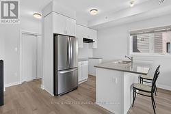 Kitchen... Closet and powder rm behind the kitchen - 