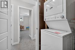 Laundry machines opposite the bedrooms - 
