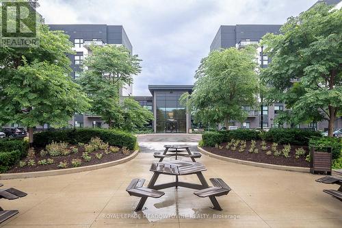 located near restaurants, shops & commuter routes - 205 - 102 Grovewood Common, Oakville, ON 