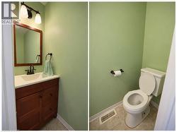Vanity with wood-finish cabinetry, white countertop, and an undermount sink - 