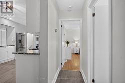 main floor hallway to primary bedroom - 
