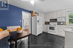 Banquette seating set off this kitchen! - 