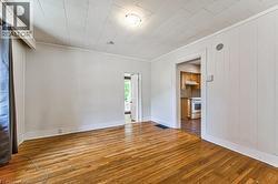 Hardwood flooring extending throughout the room - 