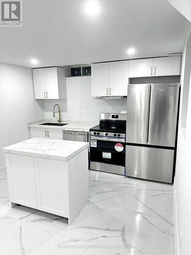 BSMT - 50 BAYCLIFFE DRIVE , Whitby, Ontario L1P 0B2 3