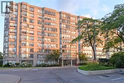 Multi-story residential building with extensive fenestration - 