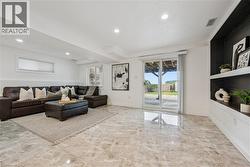 Recessed lighting, large format tile flooring, built-in shelving, sliding glass door, and a horizontal window - 