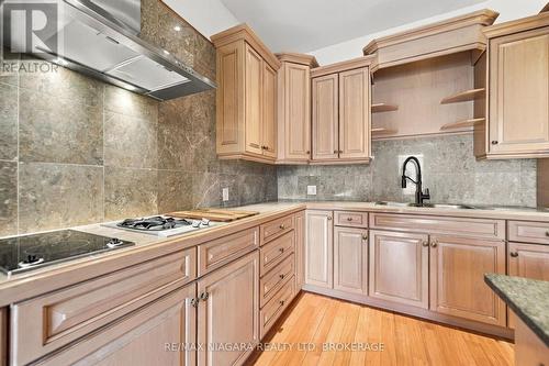 Stone counters and hardwood cabinetry. - 8 Trafalgar Street, St. Catharines (Downtown), ON 