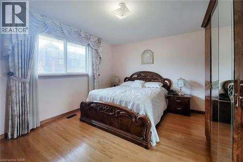 Wood-finish flooring throughout - 276 Greencedar Drive, Hamilton, ON 