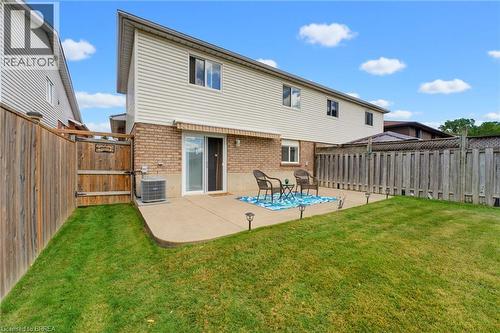 View of the patio and retractable awning - 42 Buchanan Crescent, Brantford, ON 