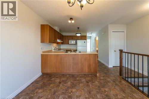 619 WILD GINGER Avenue Unit# J54 , Waterloo, Ontario N2V 2X1 4