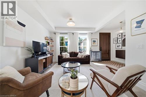 White walls featuring a tray ceiling and recessed lighting - 57 Terrace Hill Street, Brantford, ON 