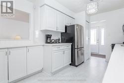 Fresh flooring and plenty of storage throughout. - 