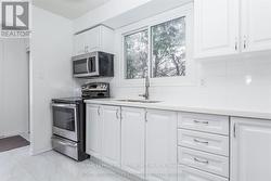 Plenty of workspace for cooking and baking. - 