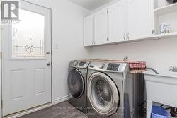 Main-floor laundry with separate access. - 