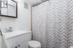 A full bathroom serves the lower level. - 