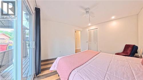 Wood-finish flooring, recessed lighting, and a ceiling fan - 380 Grangewood Drive, Waterloo, ON 