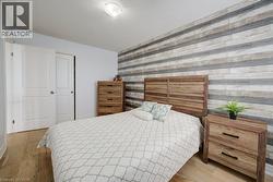 Wood-finish flooring present throughout the space - 