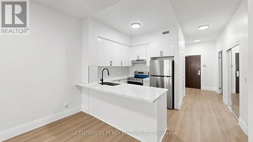 102 - 57 Upper Duke Crescent, Markham, ON 