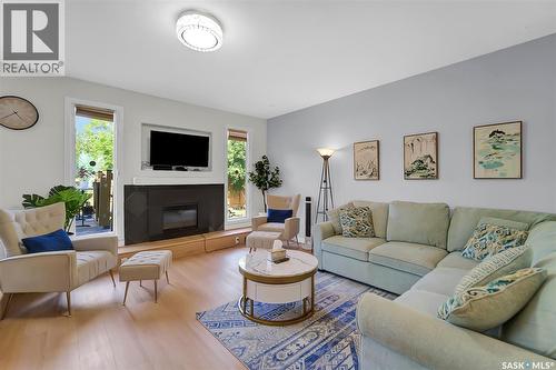 19 Barr Place, Saskatoon, SK - Indoor Photo Showing Living Room With Fireplace