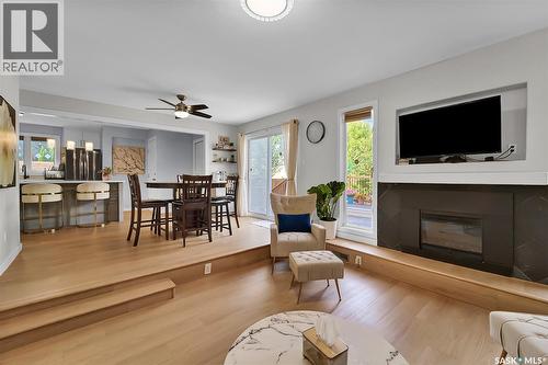 19 Barr Place, Saskatoon, SK - Indoor Photo Showing Living Room With Fireplace