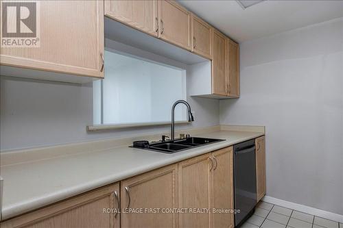709 - 65 Ellen Street, Barrie, ON - Indoor Photo Showing Kitchen With Double Sink