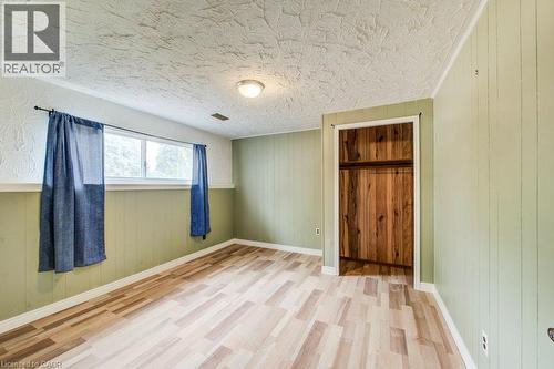 Light flooring, paneled walls - 109 White Oak Place, Waterloo, ON - Indoor Photo Showing Other Room