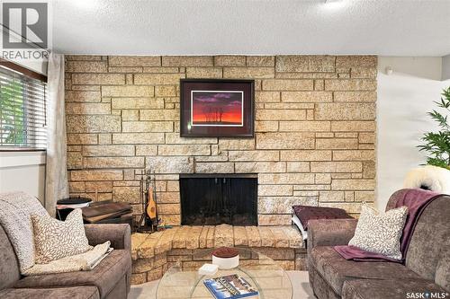 273 Carleton Drive, Saskatoon, SK - Indoor Photo Showing Living Room With Fireplace