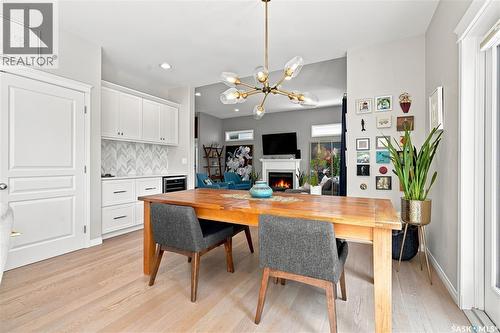 554 Lynd Place, Saskatoon, SK - Indoor Photo Showing Dining Room With Fireplace
