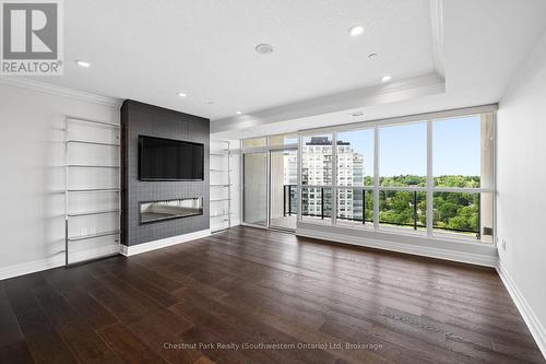River Mill | 1503-150 Wellington Street E., Guelph - 1503 - 150 Wellington Street E, Guelph (Downtown), ON - Indoor Photo Showing Living Room With Fireplace