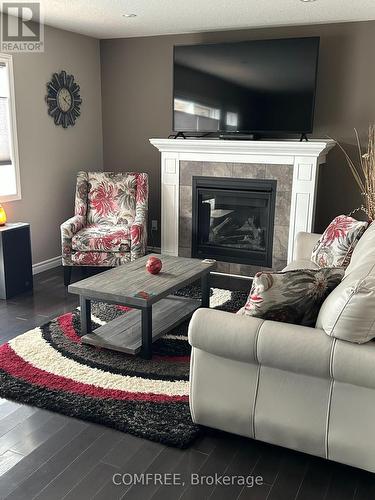 235 Spencer Drive, Centre Wellington (Elora/Salem), ON - Indoor Photo Showing Living Room With Fireplace