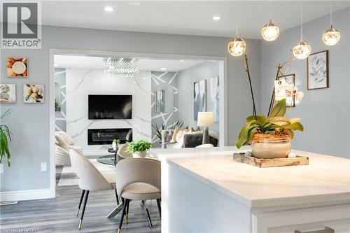 151 Baldwin Drive, Cambridge, ON - Indoor Photo Showing Dining Room With Fireplace