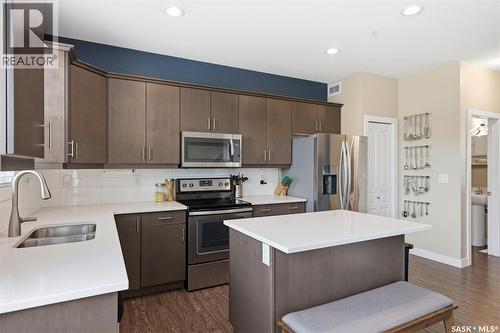 1040 Kolynchuk Crescent, Saskatoon, SK - Indoor Photo Showing Kitchen With Double Sink