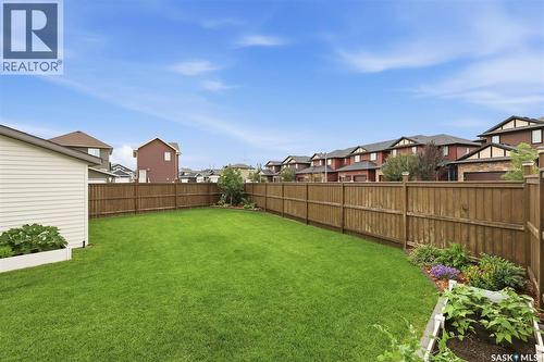 1040 Kolynchuk Crescent, Saskatoon, SK - Outdoor With Backyard