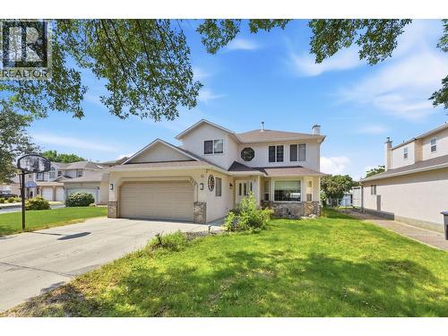 348 Phipps Crescent, Kelowna, BC - Outdoor With Deck Patio Veranda With Facade