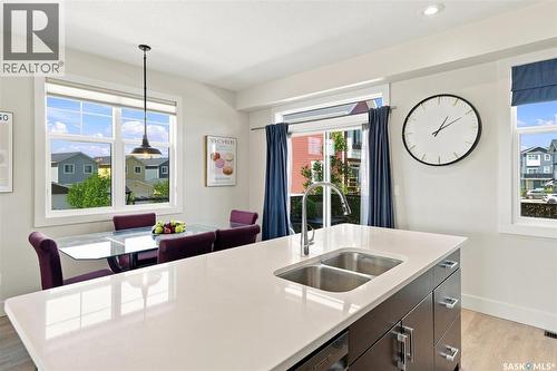 703 Meadows Boulevard, Saskatoon, SK - Indoor Photo Showing Kitchen With Double Sink