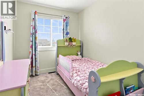 703 Meadows Boulevard, Saskatoon, SK - Indoor Photo Showing Bedroom