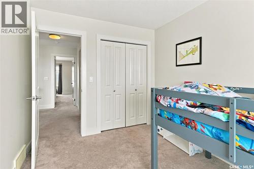 703 Meadows Boulevard, Saskatoon, SK - Indoor Photo Showing Bedroom
