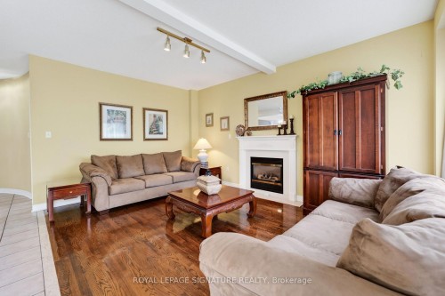 6847 Simpson Pioneer Trail, Mississauga, ON - Indoor Photo Showing Living Room With Fireplace