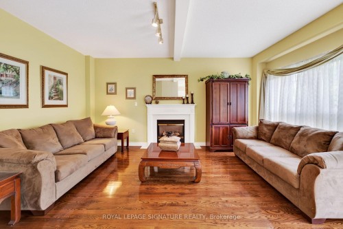 6847 Simpson Pioneer Trail, Mississauga, ON - Indoor Photo Showing Living Room With Fireplace