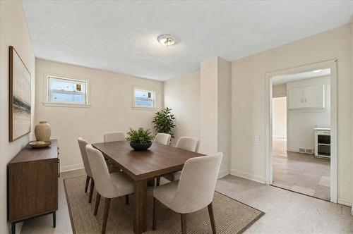 Virtually staged for design and layout inspiration. - 287 Boyd Avenue, Winnipeg, MB - Indoor Photo Showing Dining Room