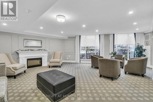 406 - 356 Mcrae Drive, Toronto, ON - Indoor With Fireplace
