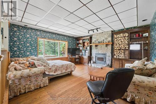 Lower level family room - walk out with fireplace - 7530 Macpherson Lane, Puslinch, ON 
