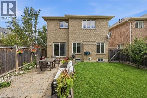 Brick exterior with multiple windows - 738 Fourth Line, Milton, ON - Outdoor With Exterior