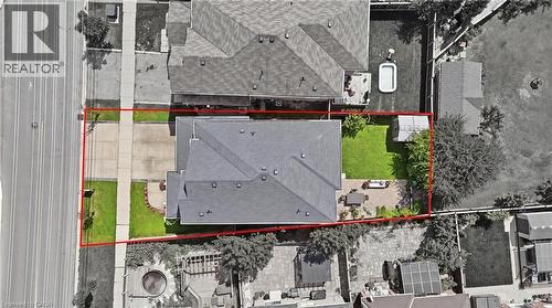 Expansive lot featuring a large driveway, established landscaping, and a manicured lawn - 738 Fourth Line, Milton, ON - Other