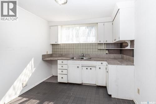 2113 Louise Avenue, Saskatoon, SK - Indoor Photo Showing Kitchen With Double Sink