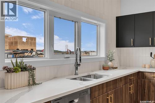 118 Amisk Way, Saskatoon, SK - Indoor Photo Showing Kitchen With Double Sink