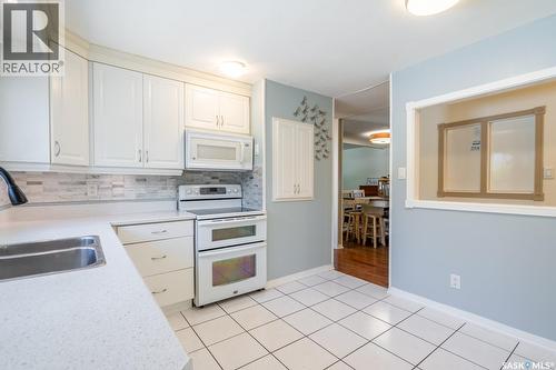 24 Mayfair Crescent, Regina, SK - Indoor Photo Showing Kitchen With Double Sink
